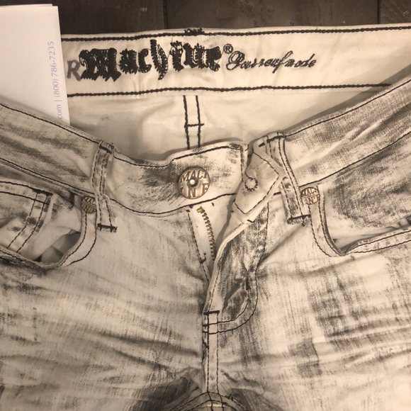 Acid wash jeans with intentional distressing - Picture 2 of 7